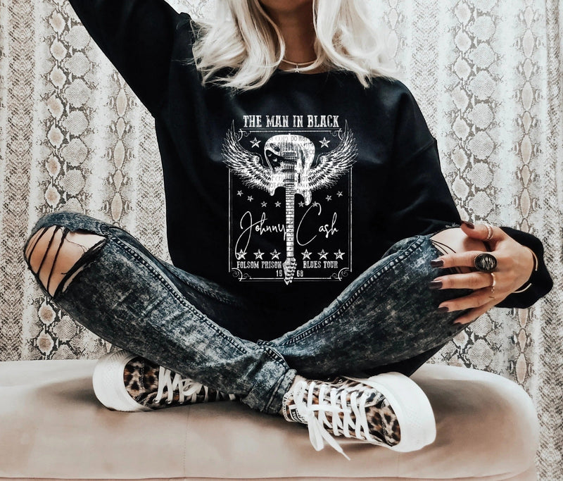 The man in black Sweatshirt